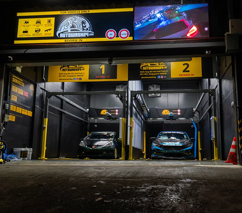 Autowash24 AMK automatic car wash bays at night