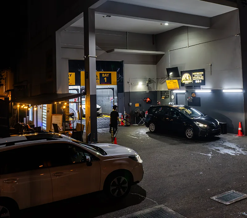 Autowash24 Changi automatic car wash bays at night